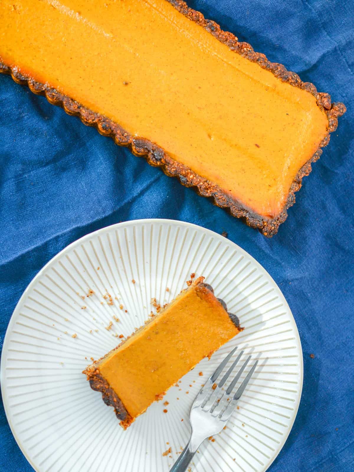 a homemade vegan pumpkin pie tart, rectangular