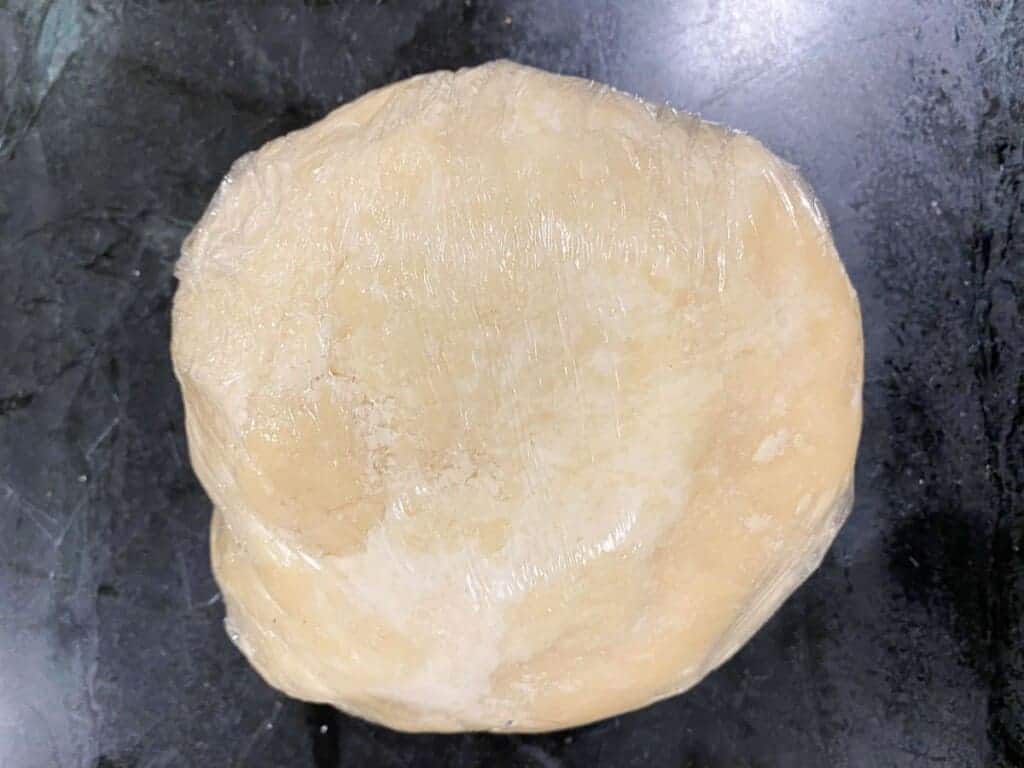 wrap the pie dough tightly in plastic wrap