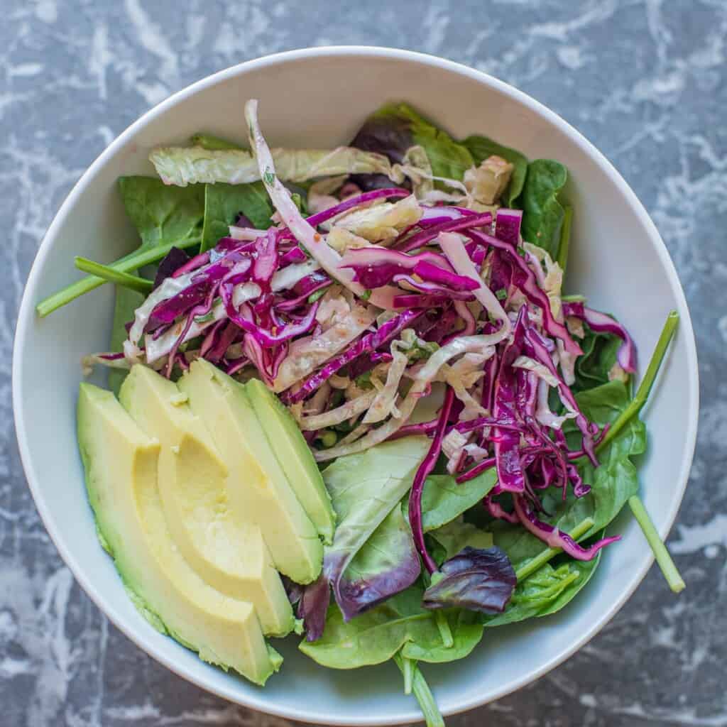 add avocado to the meal prep bowl