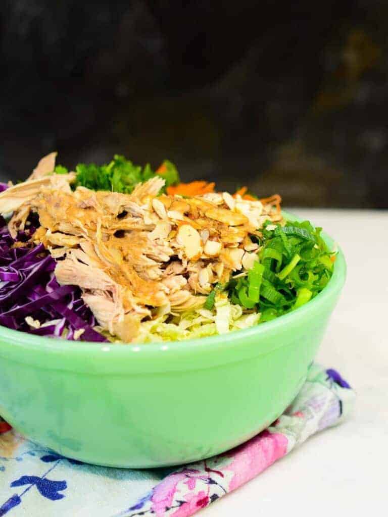 easy asian chicken salad recipe with toasted almonds and sesame ginger dressing