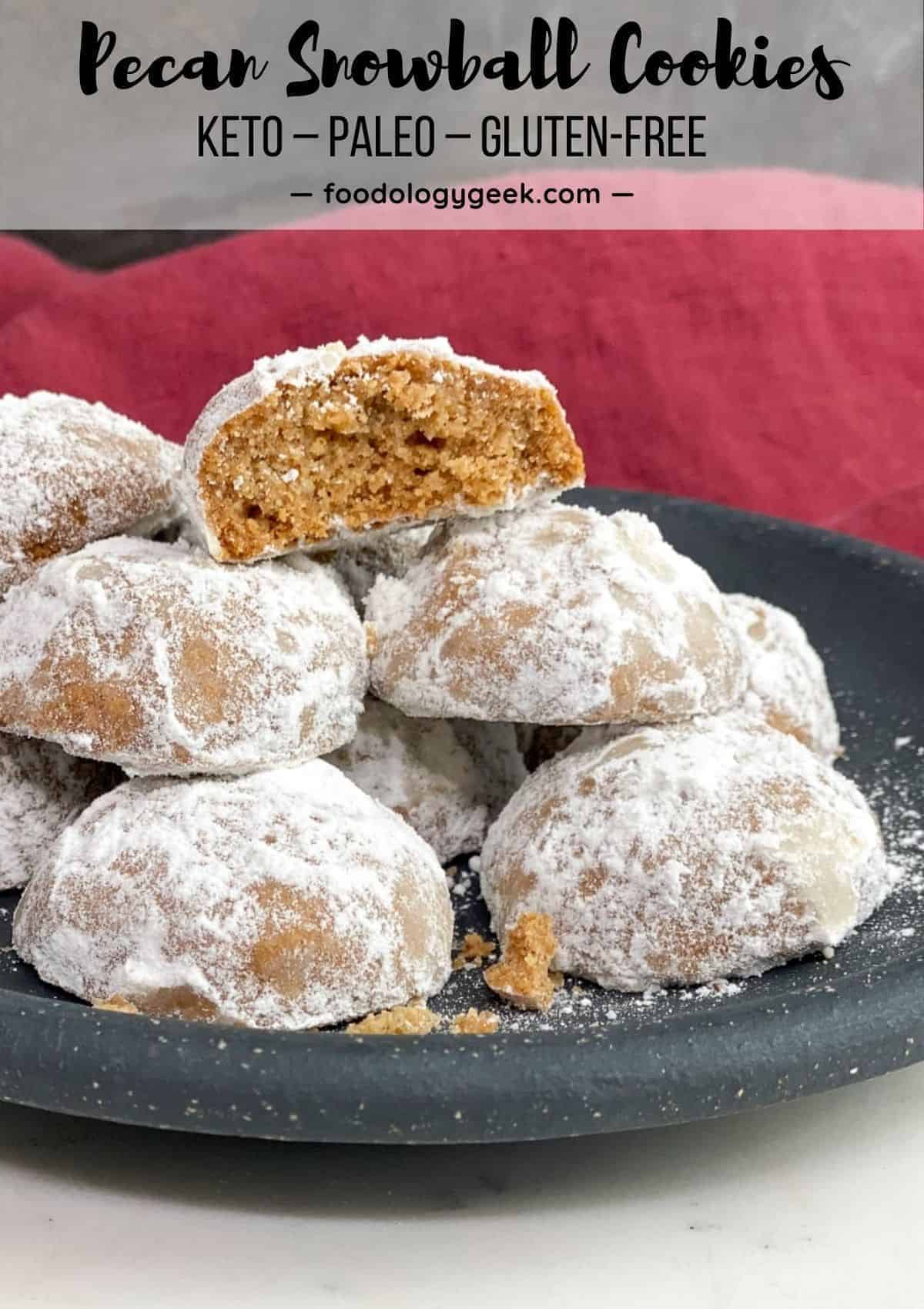 keto pecan cookies stacked on a black plate