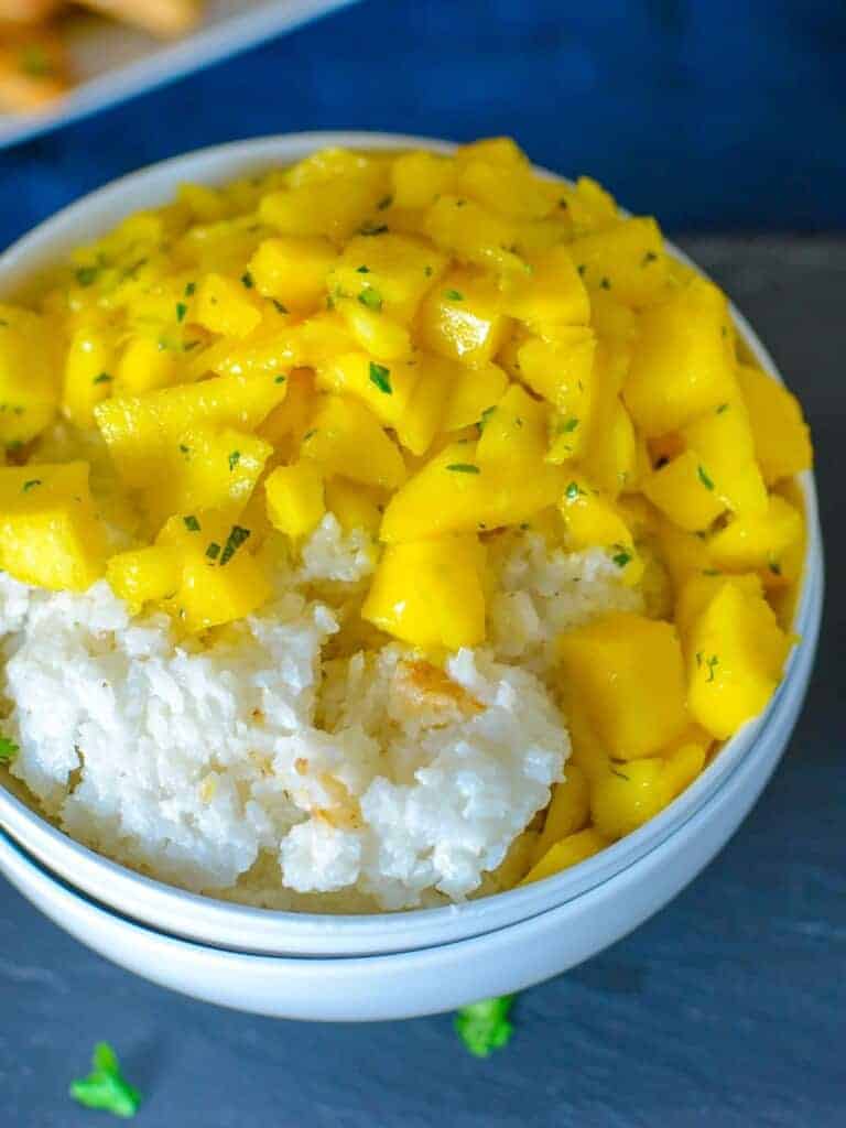 mango coconut rice in a bowl