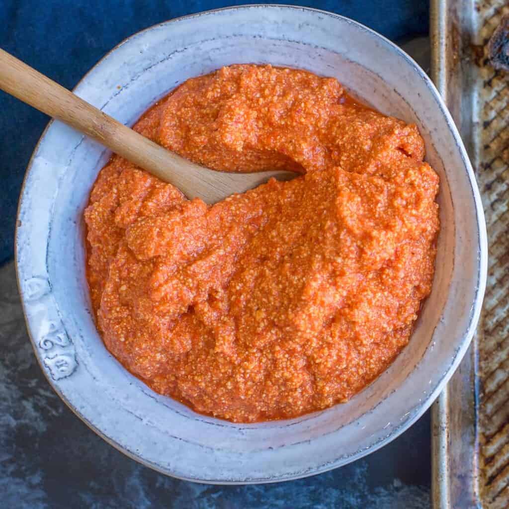 easy red pepper dip in a white bowl