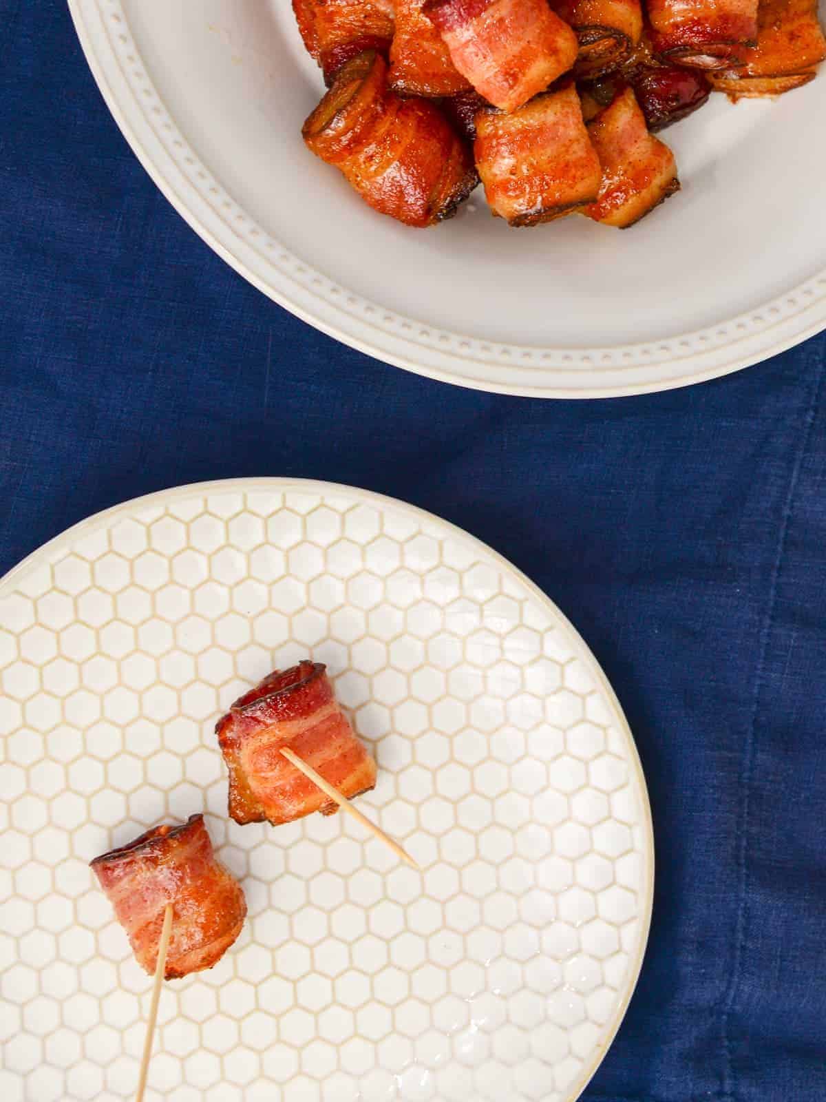 bacon wrapped shrimp on a plate