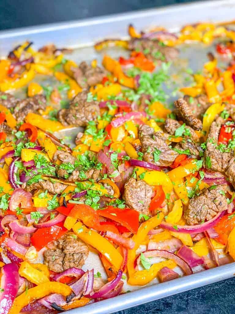 steak fajitas on a sheet pan