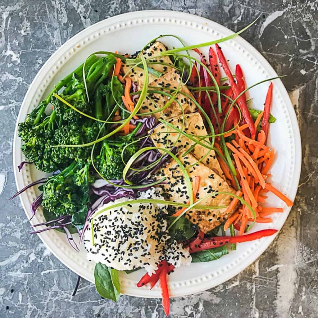 healthy vegan teriyaki bowl with extra firm tofu and lots of veggies