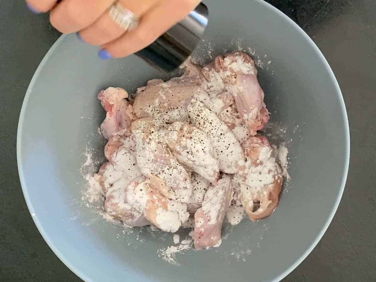 Add baking powder and salt and pepper to the wings
