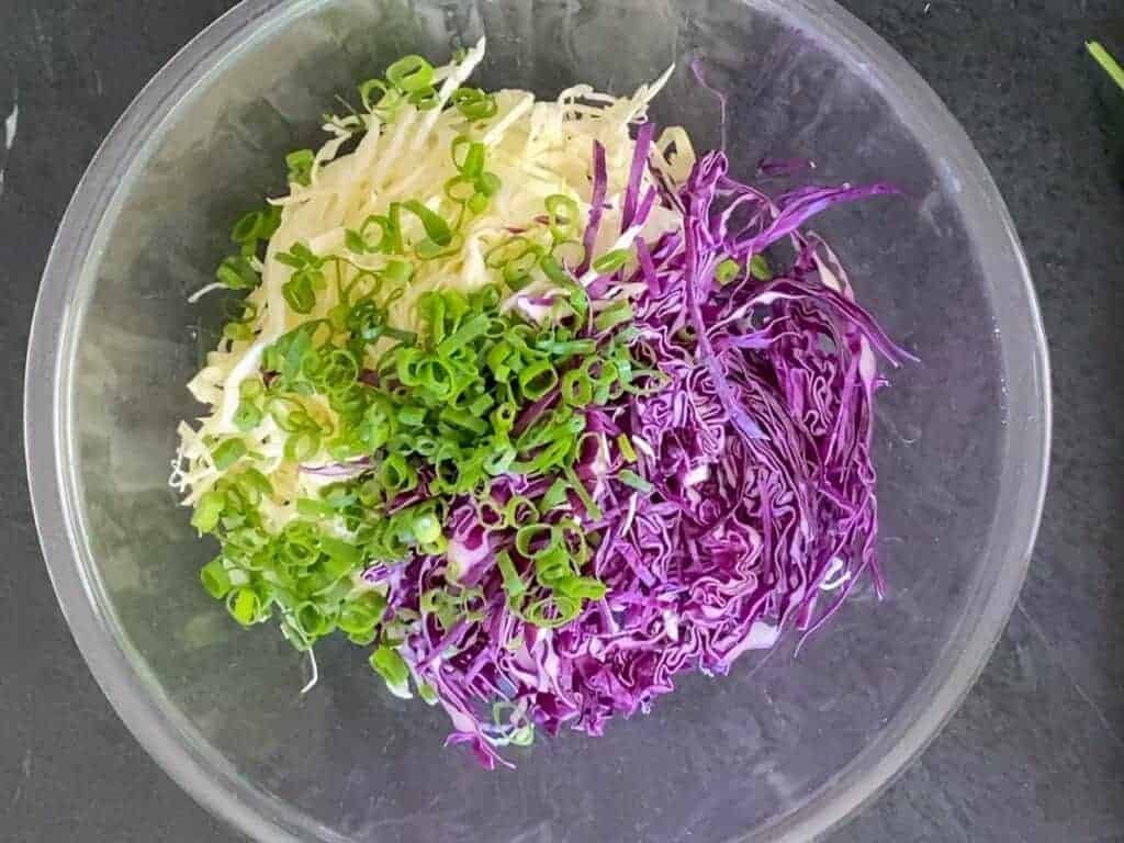 add the green onions to the taco slaw