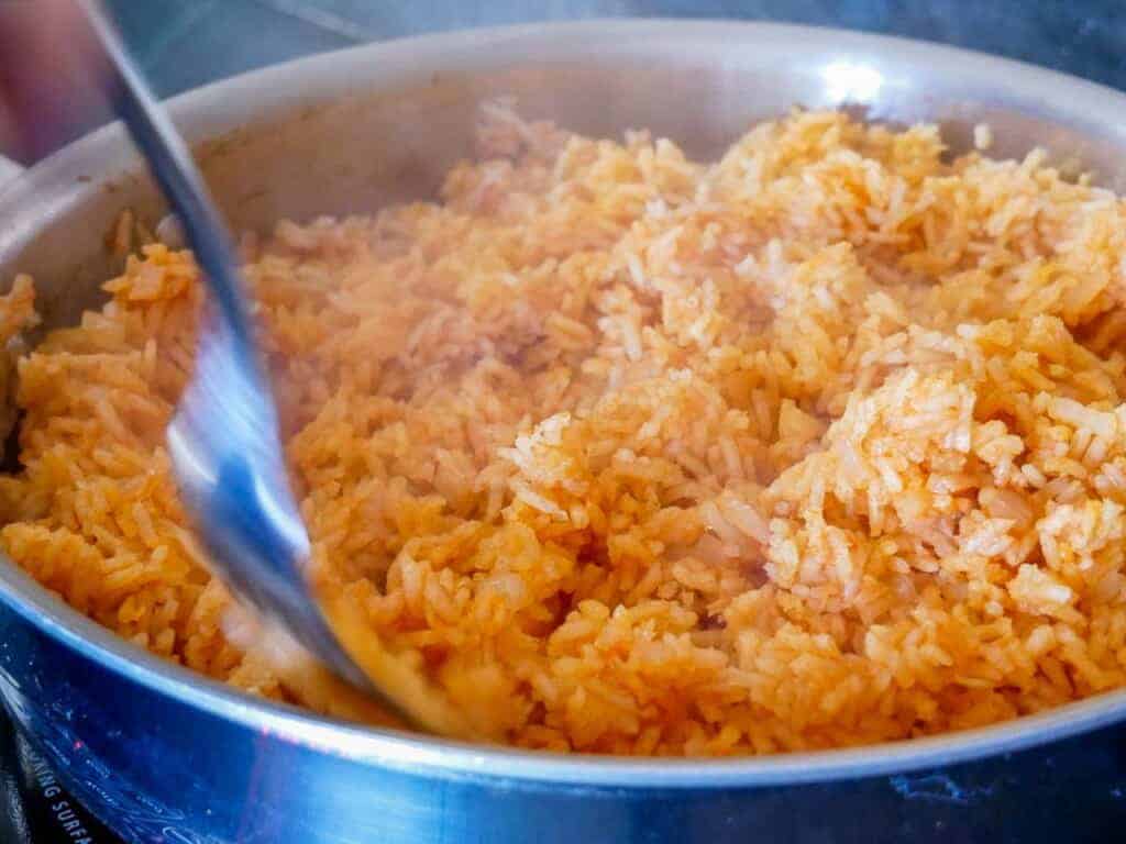 remove the lid and fluff the rice with a fork