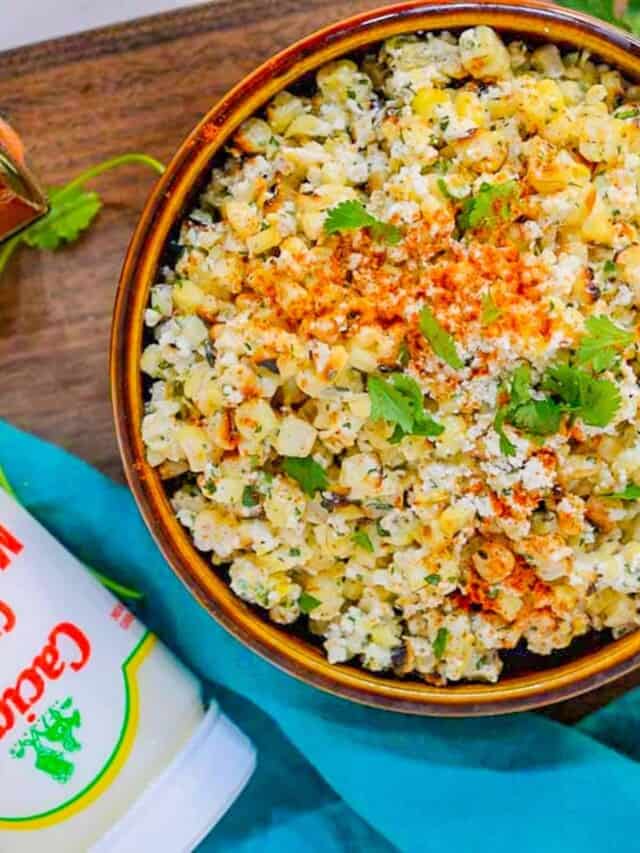 Mexican street corn salad recipe with crema and a spicy creamy sauce