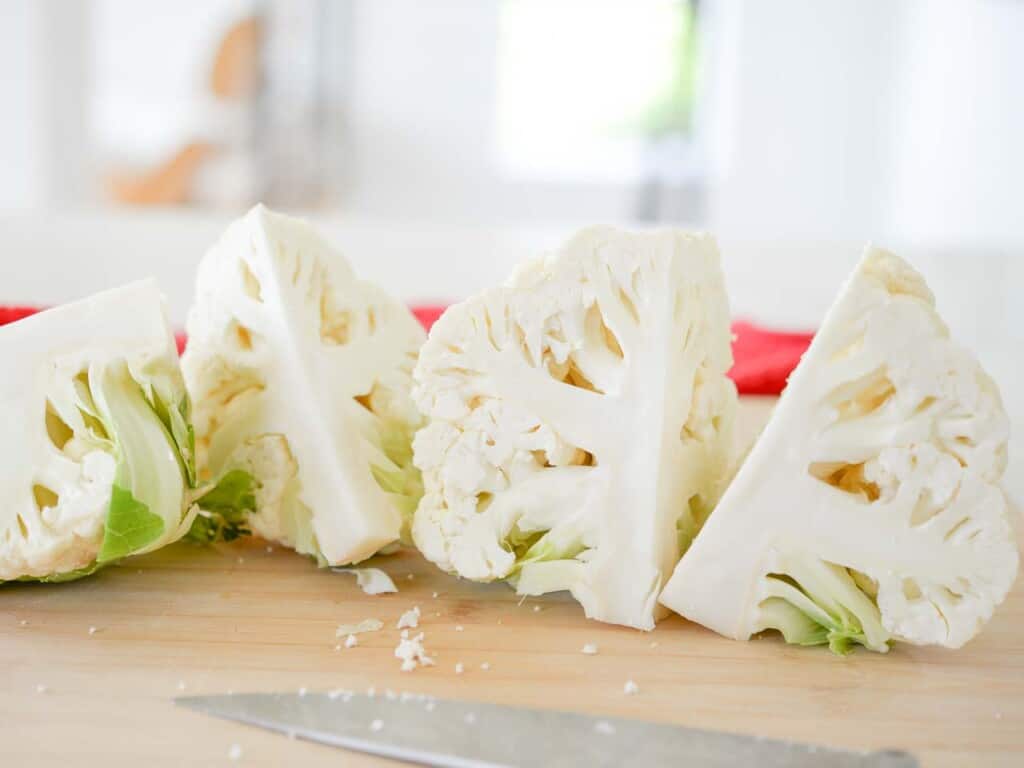 a head of cauliflower, cut in quarter