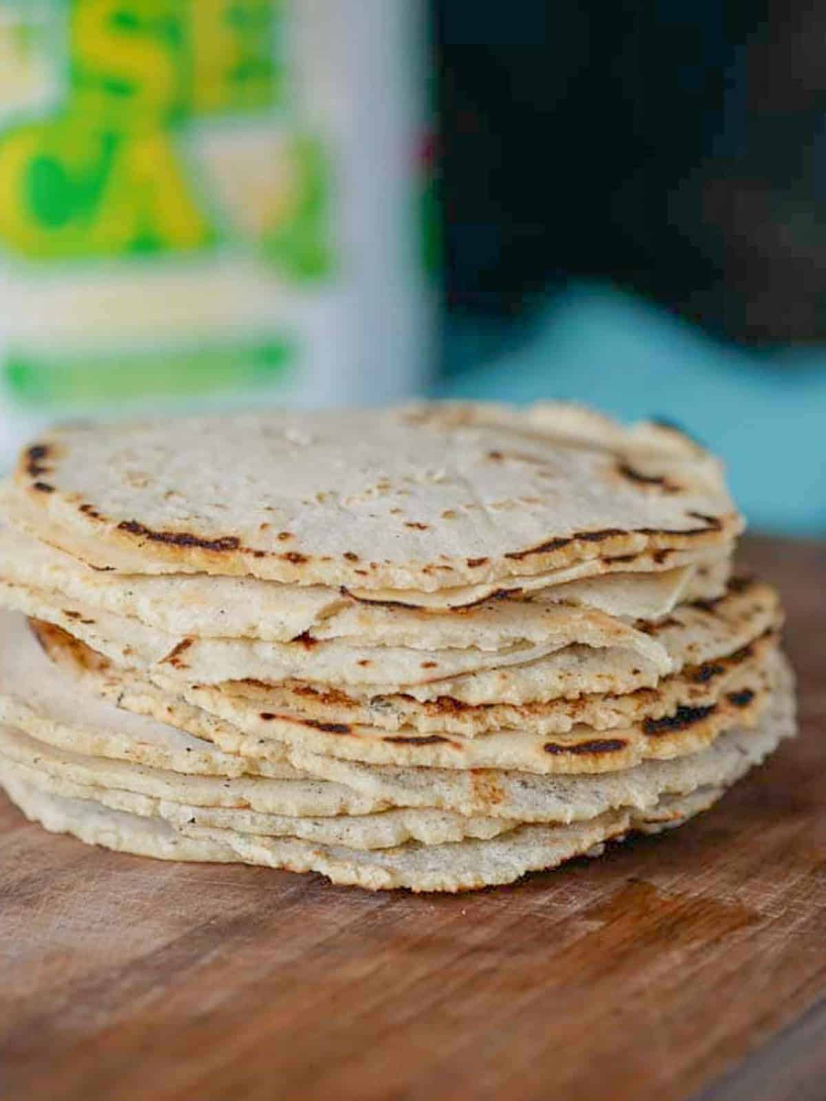 a stack of homemade corn tortillas