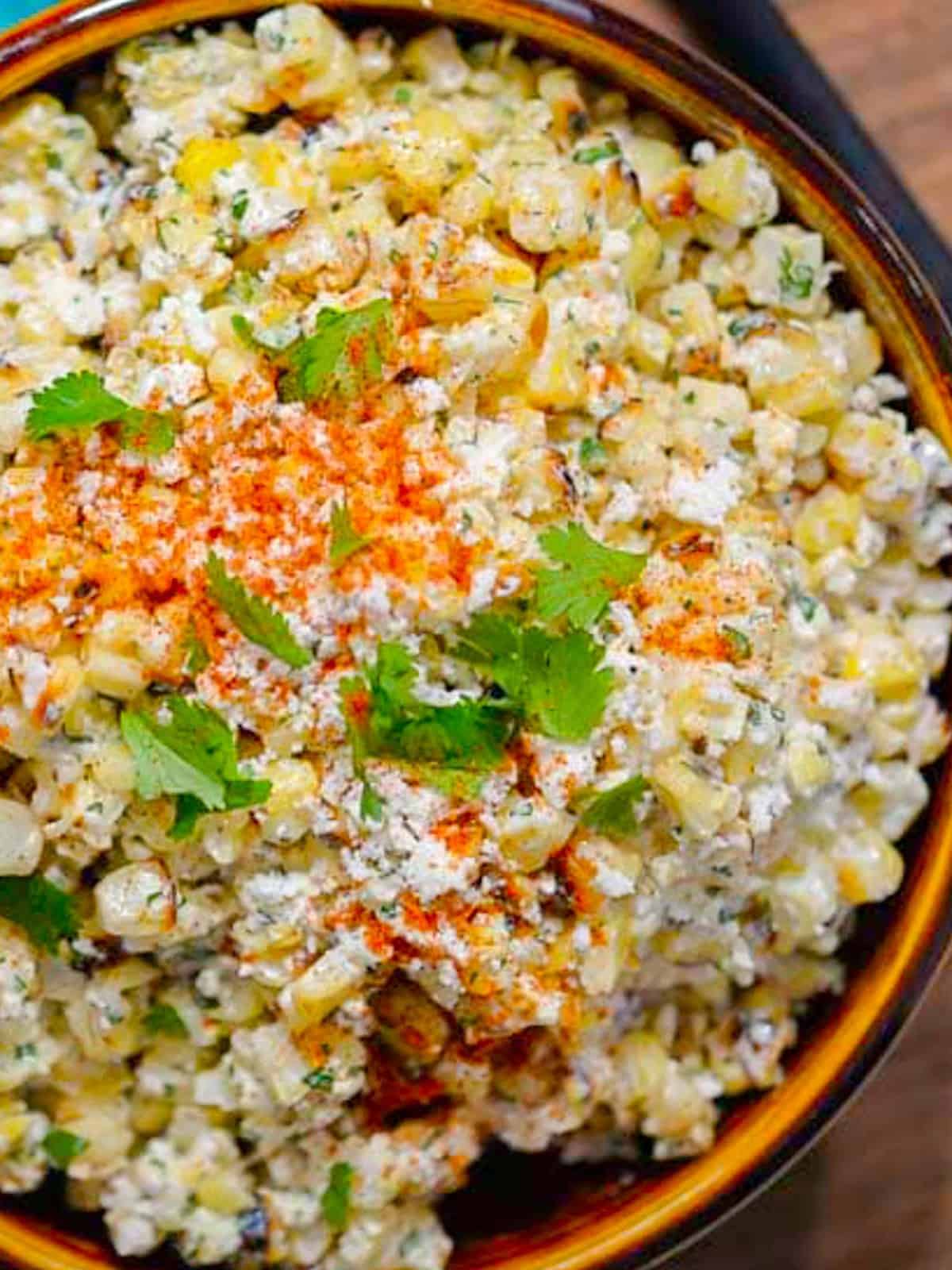 esquites (mexican corn salad) with creamy, spicy dressing