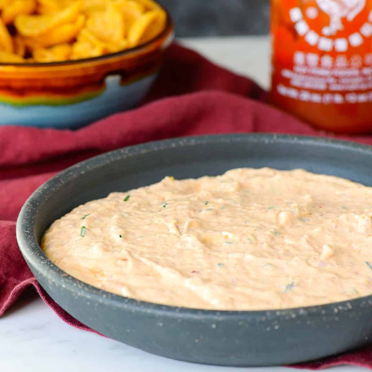 hawaiian kimchi dip served with a side of Fritos scoops