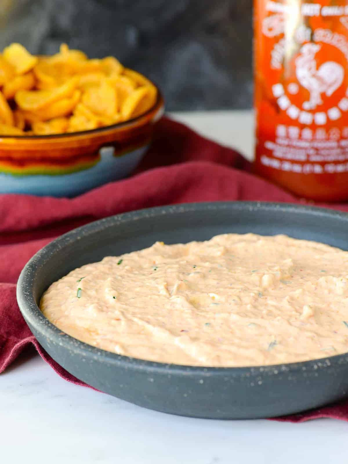 hawaiian kimchi dip served with a side of Fritos scoops