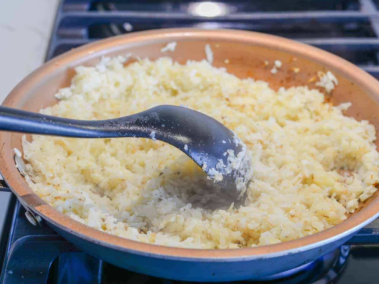 sauté cauliflower rice for 5 minutes and season