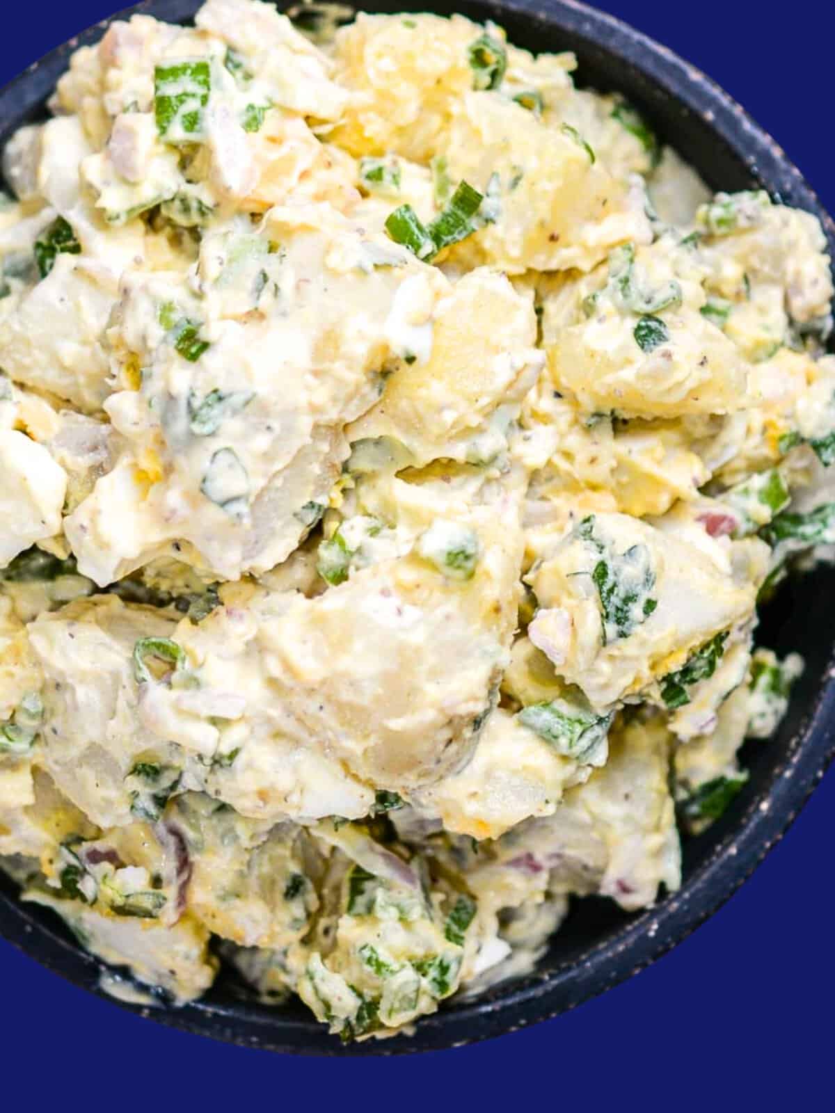 chunky potato salad with hard boiled eggs and bacon