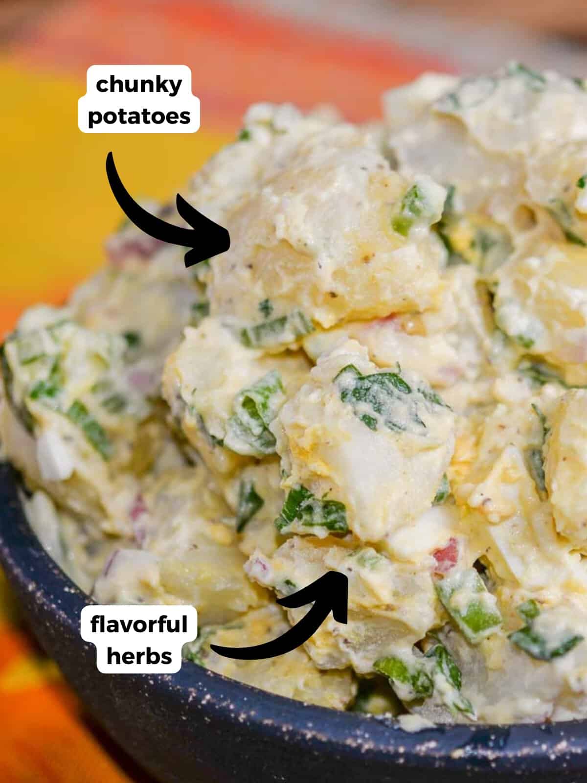 close up of potato salad with chunky potatoes and flavorful herbs