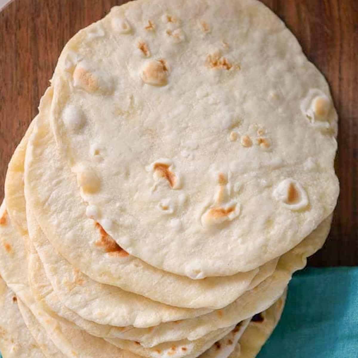 easy homemade flour tortillas on a cutting board