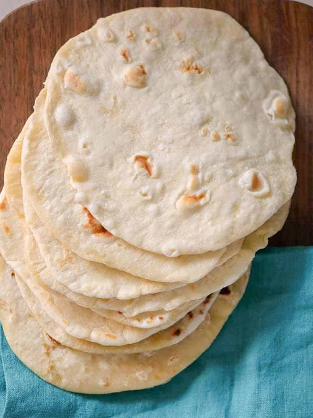 easy homemade flour tortillas on a cutting board