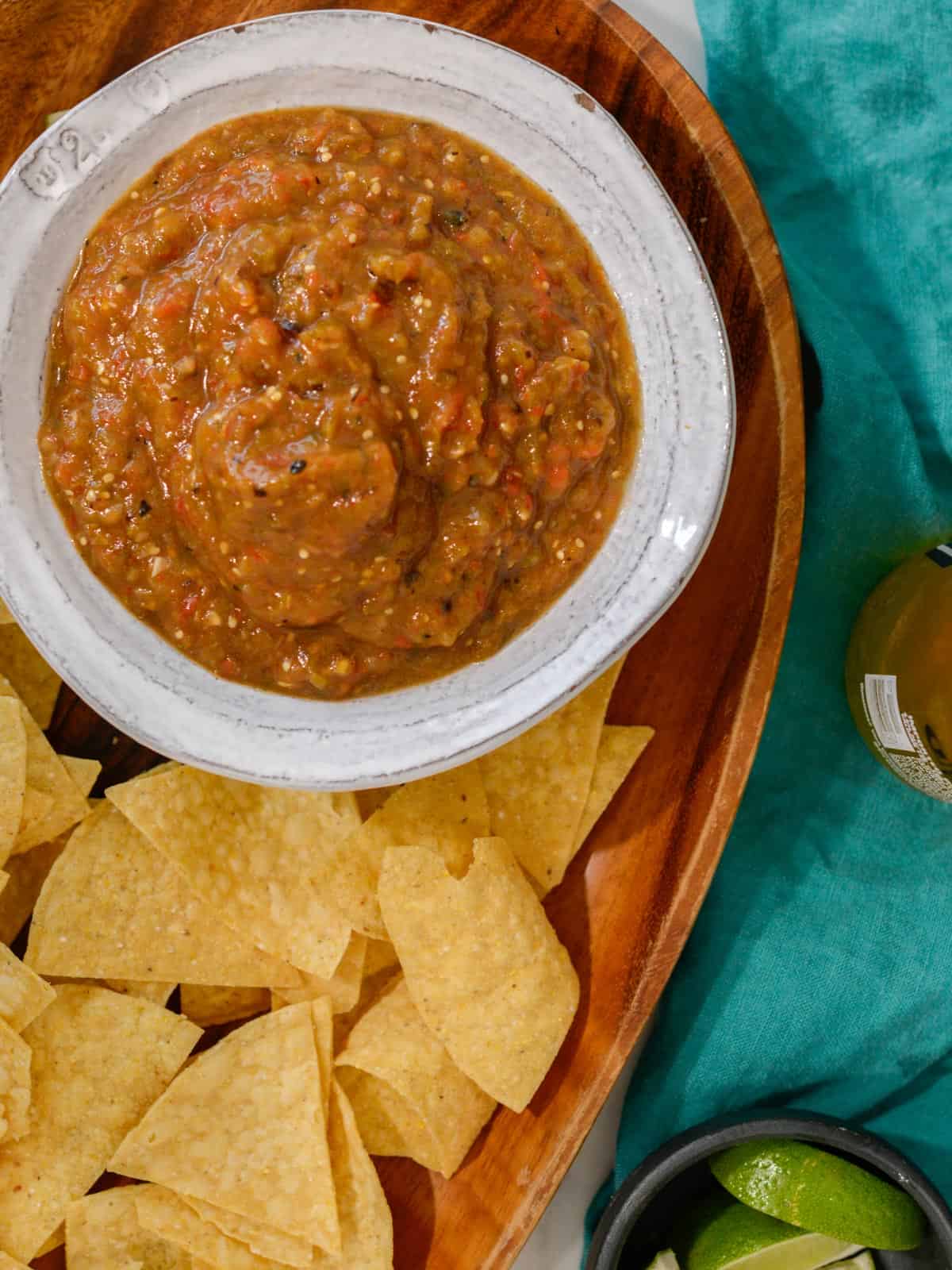 12 pepper salsa recipe served with chips and fresh limes. 