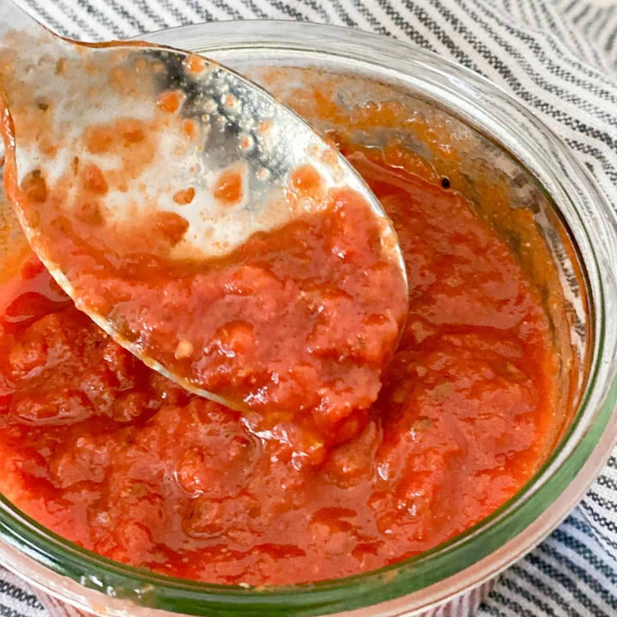 pizza sauce on a spoon, sotred in a weck jar