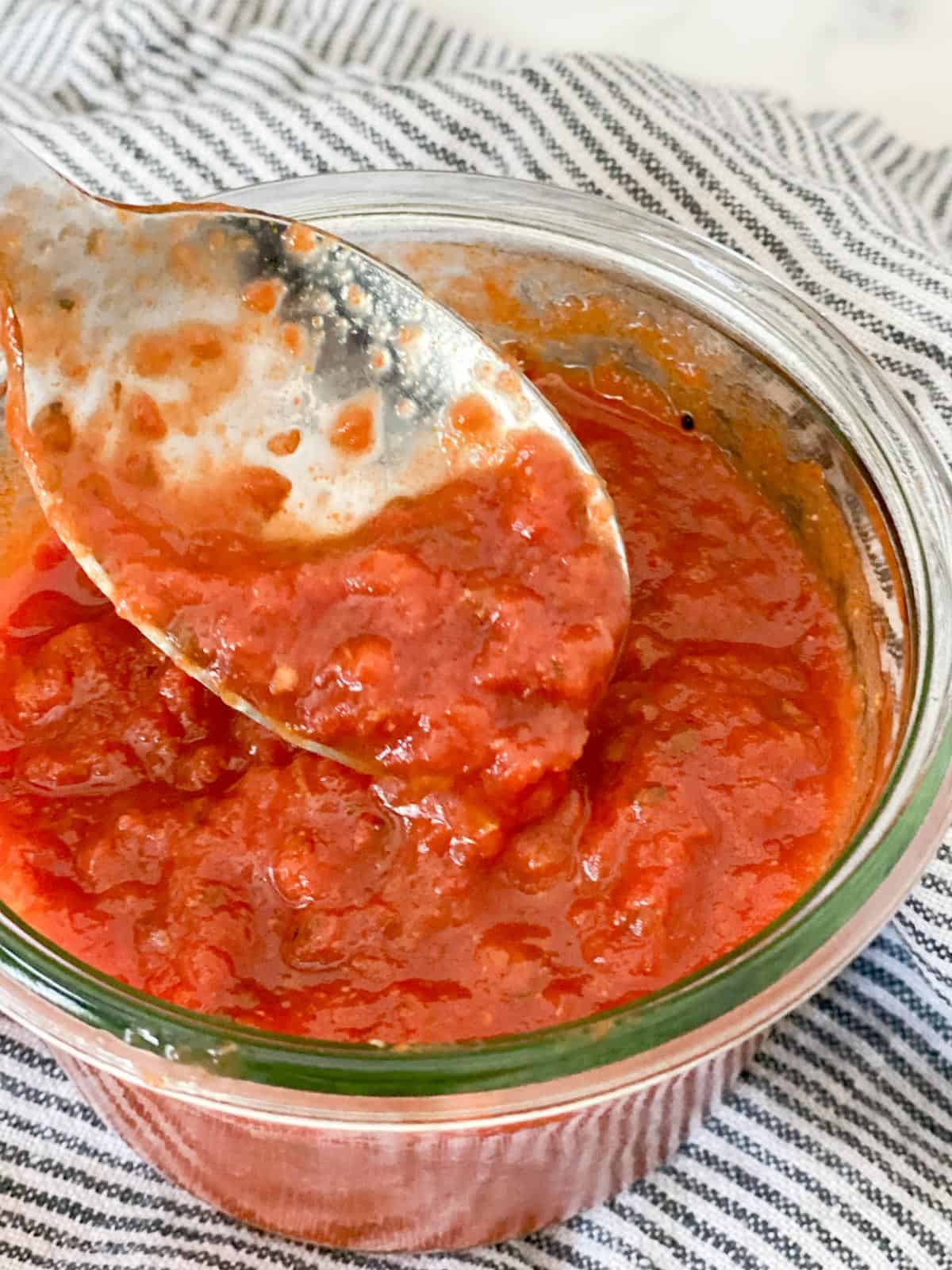 pizza sauce on a spoon, sotred in a weck jar