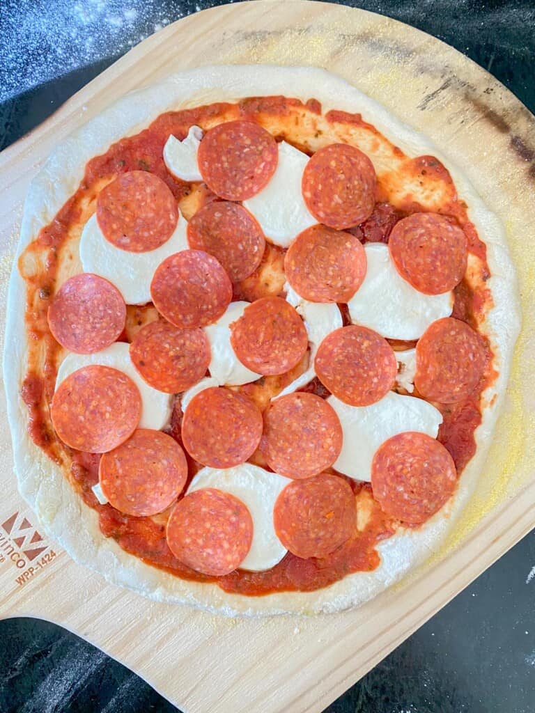 pepperoni pizza  made with homemade dough before cooking