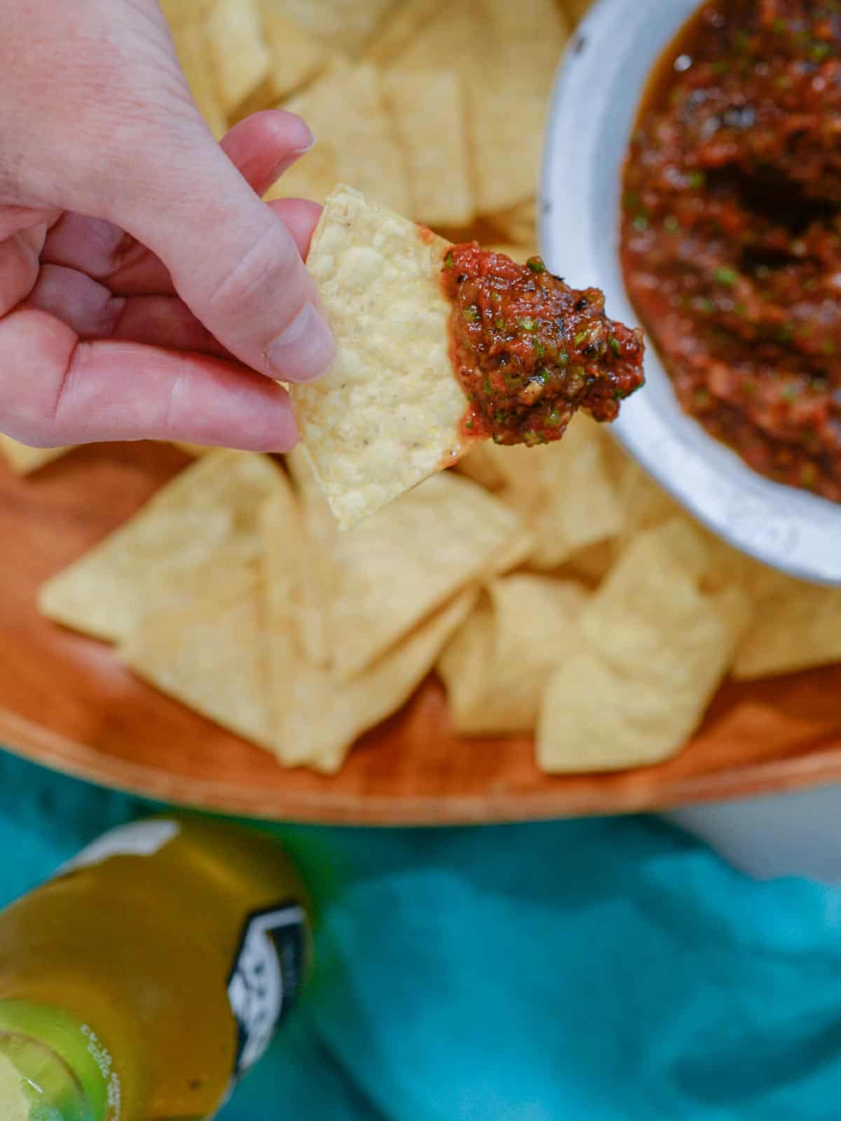 roasted tomato salsa with tortilla chips and a corona beer