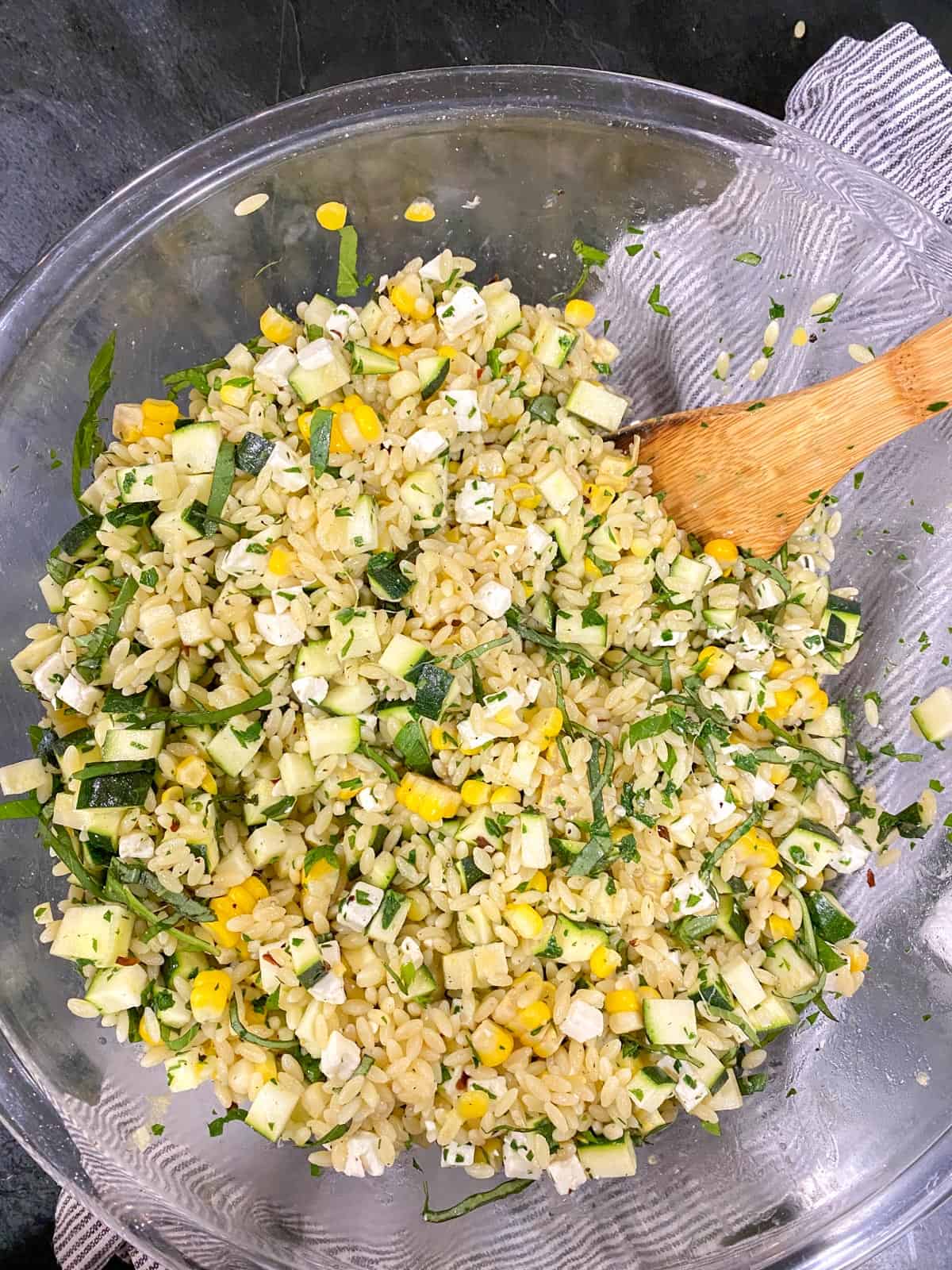 summer orzo salad mixed together