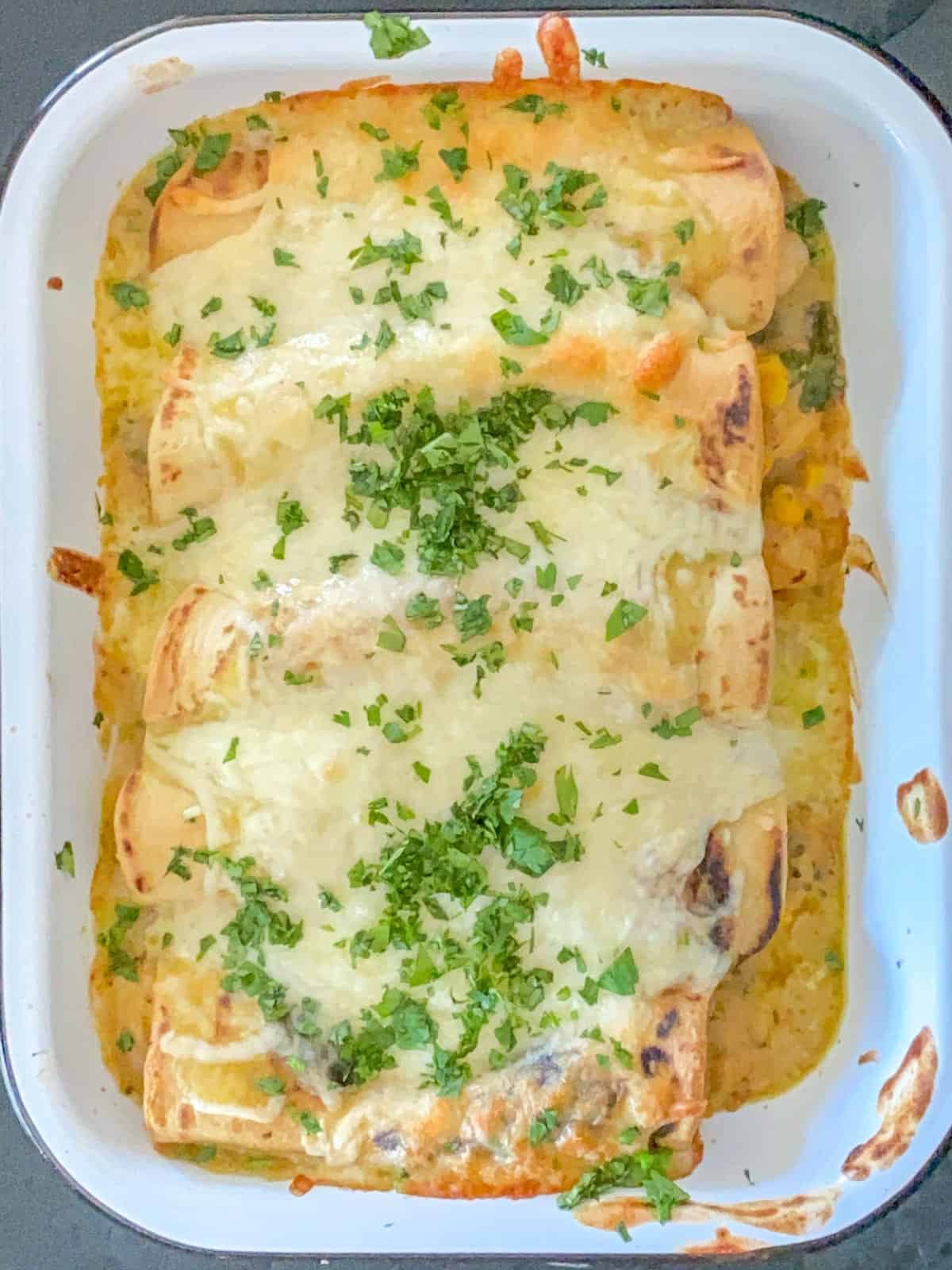 pan of seafood enchilada freshly out or the oven