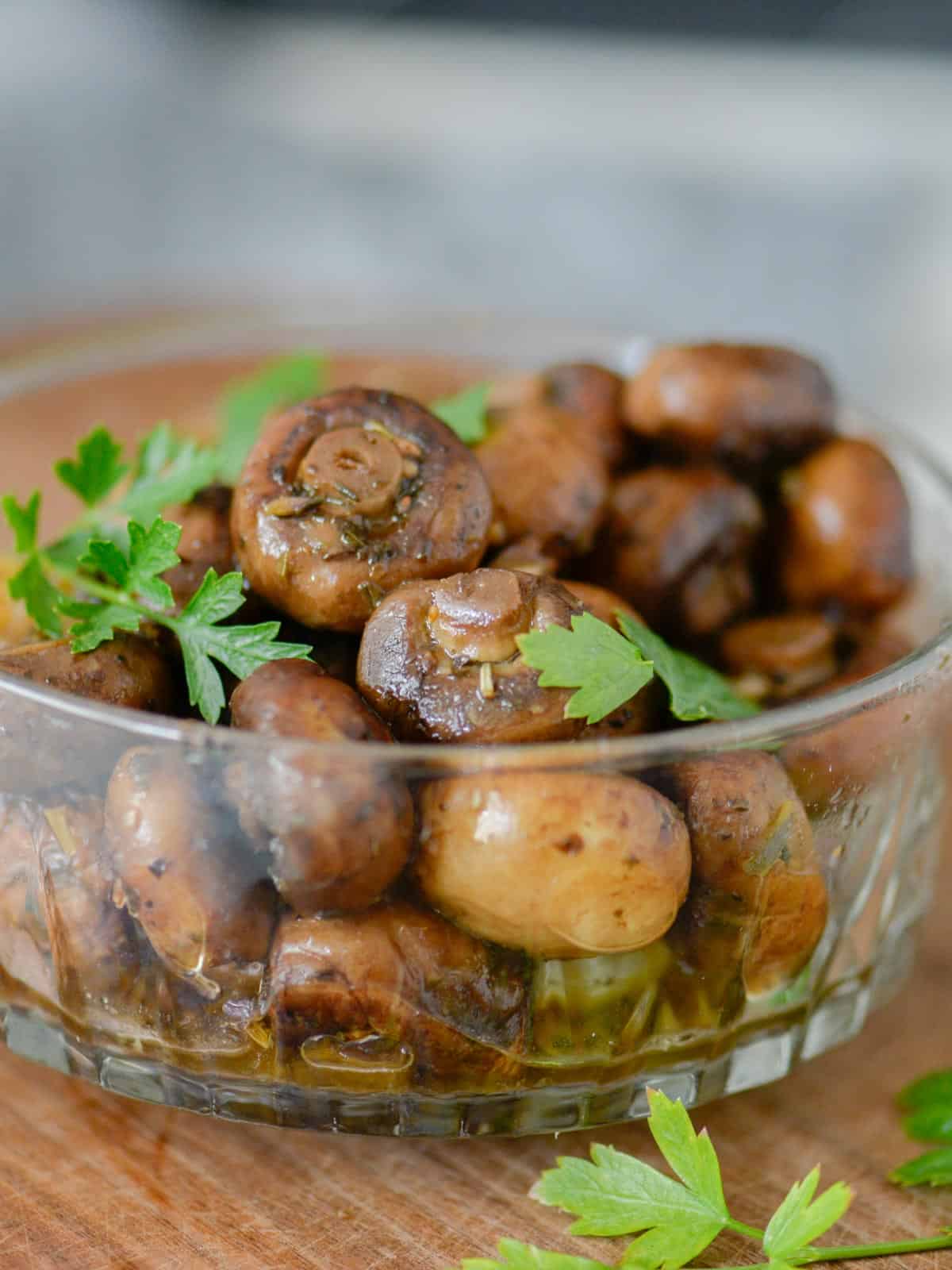 A bowl of homemade jarred mushrooms