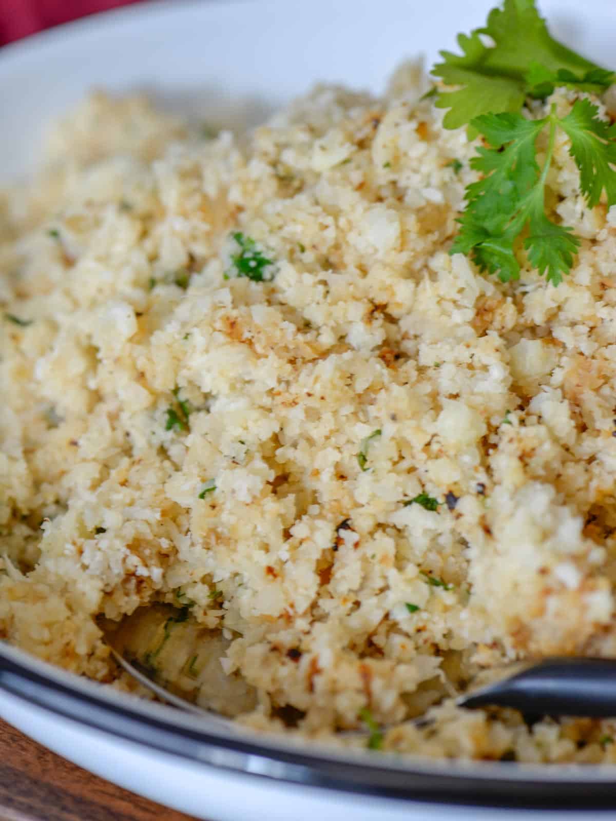 Cilantro lime cauliflower rice  in a white bowl