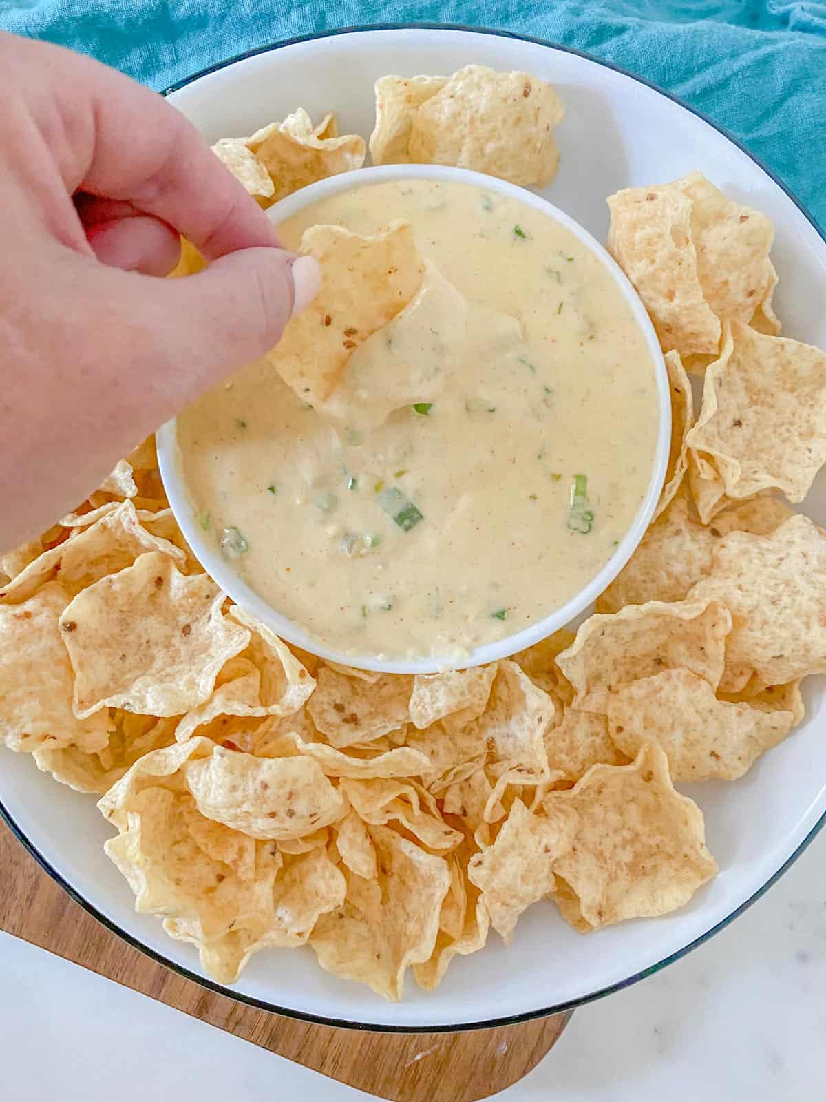 creamy queso dip with tostitos tortilla chips