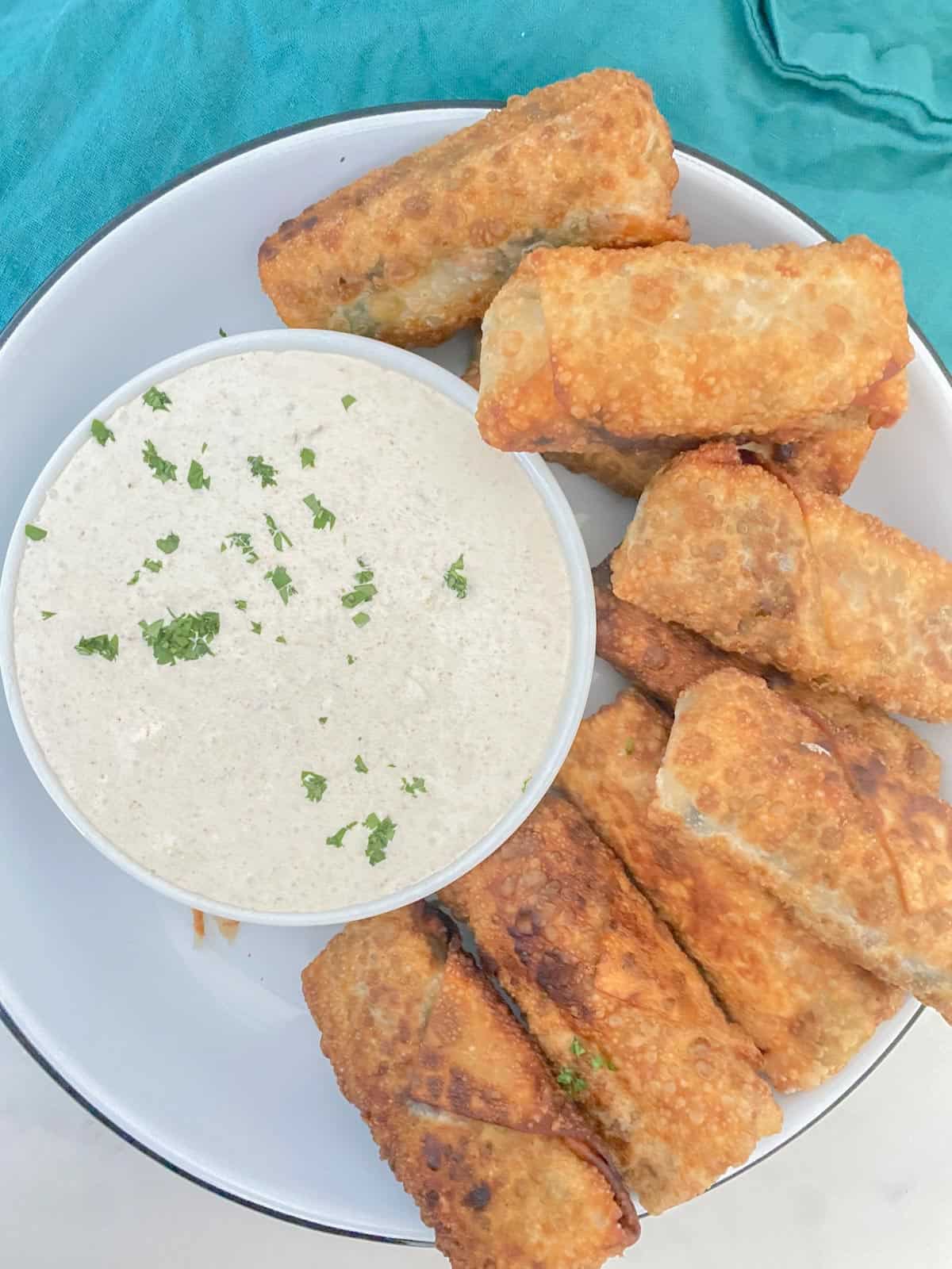 vegetarian egg rolls with a spicy dipping sauce