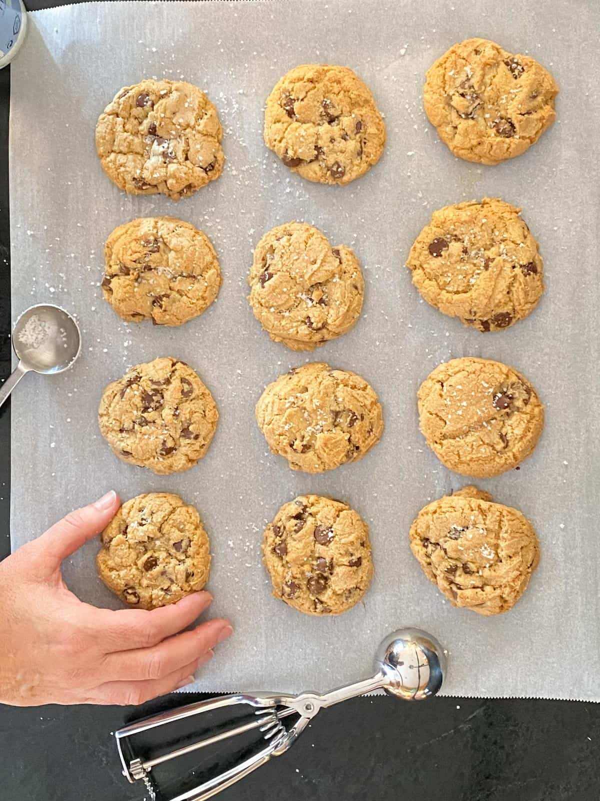 chocolate chip cookies on a baking sheet lined with parchment paper