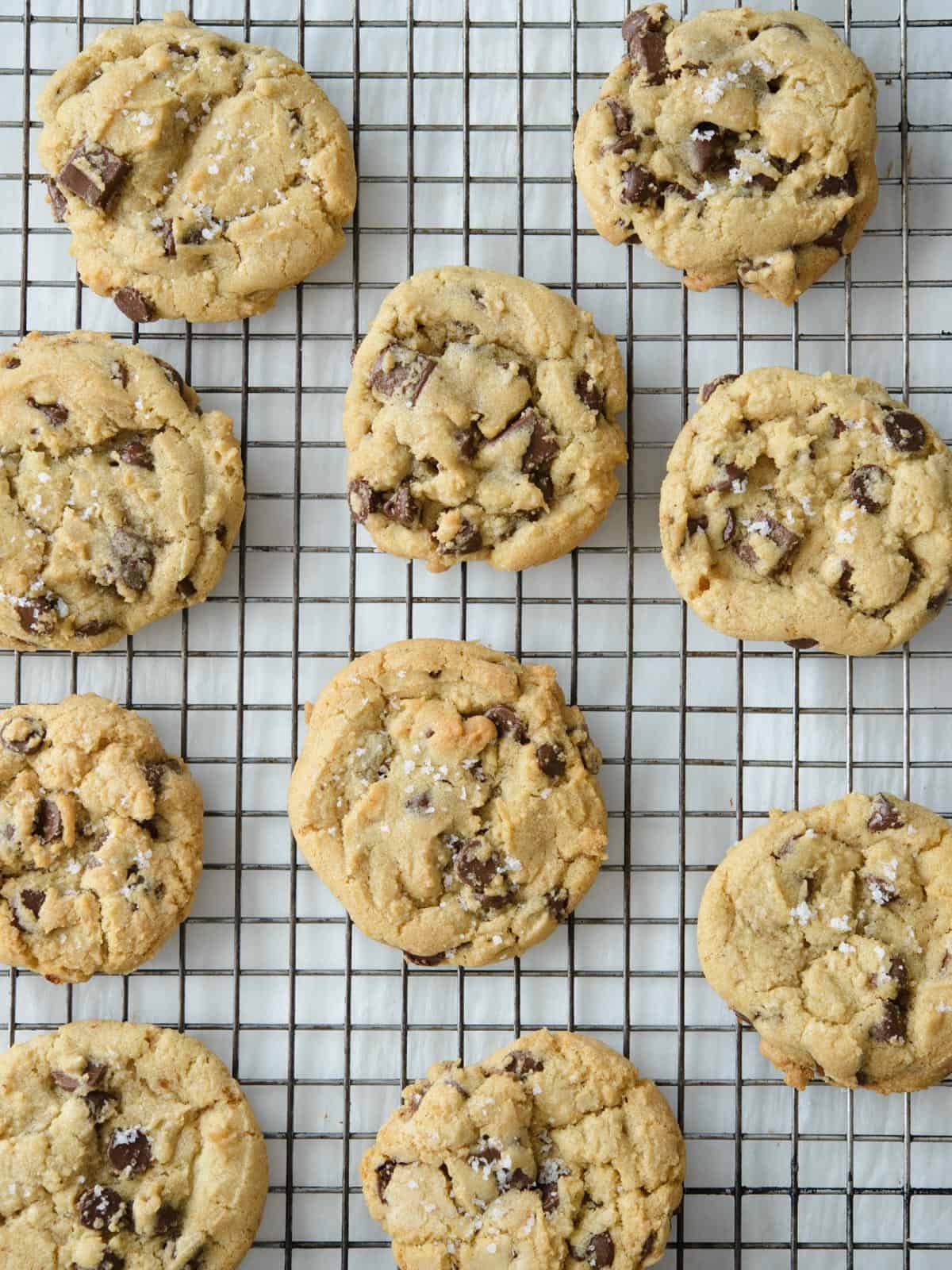 salted chocolate chip cookies on a baking rack