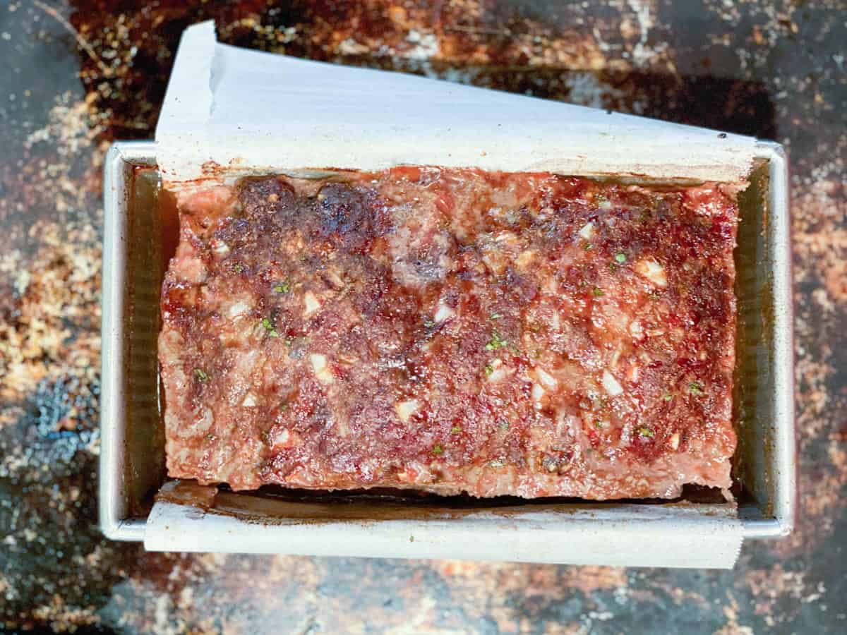 baked meatloaf before removing it from the loaf pan