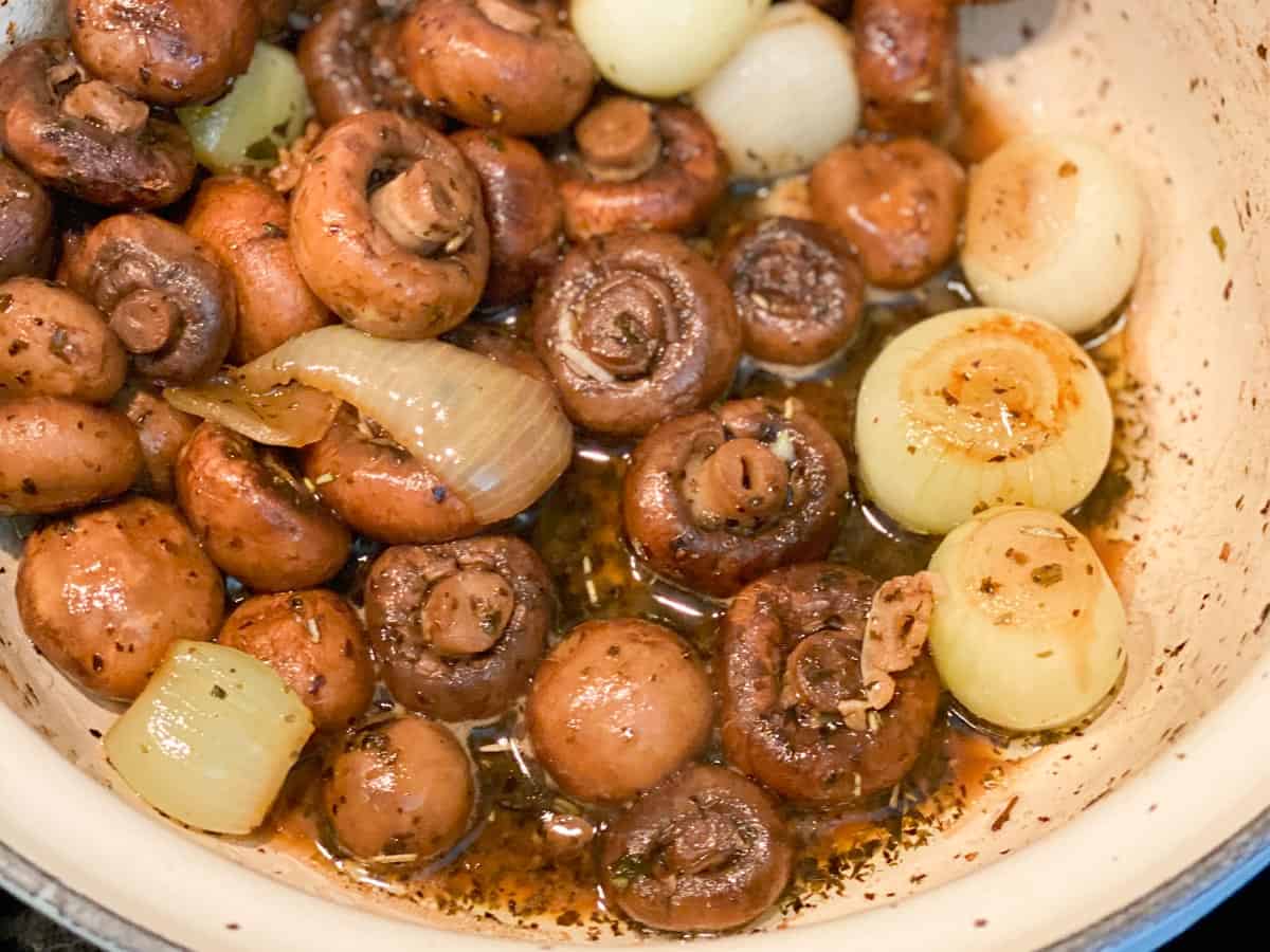 mushrooms and onions cooked down, ready to add the vinegar to marinate them