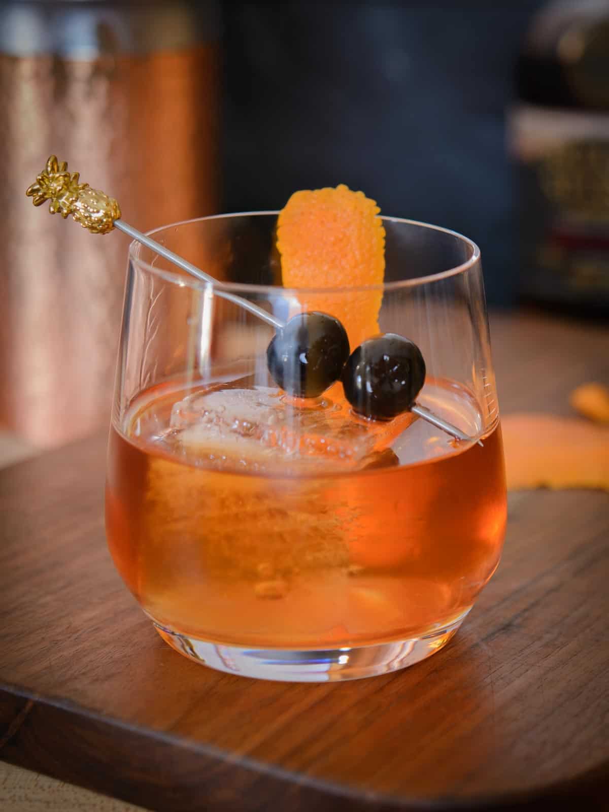 An old fashioned cocktail with luxardo cherries