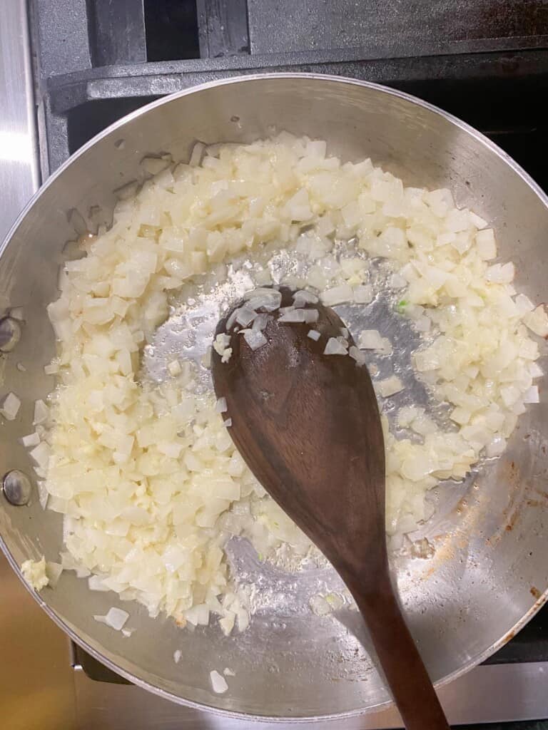 saute the onions and the garlic in butter
