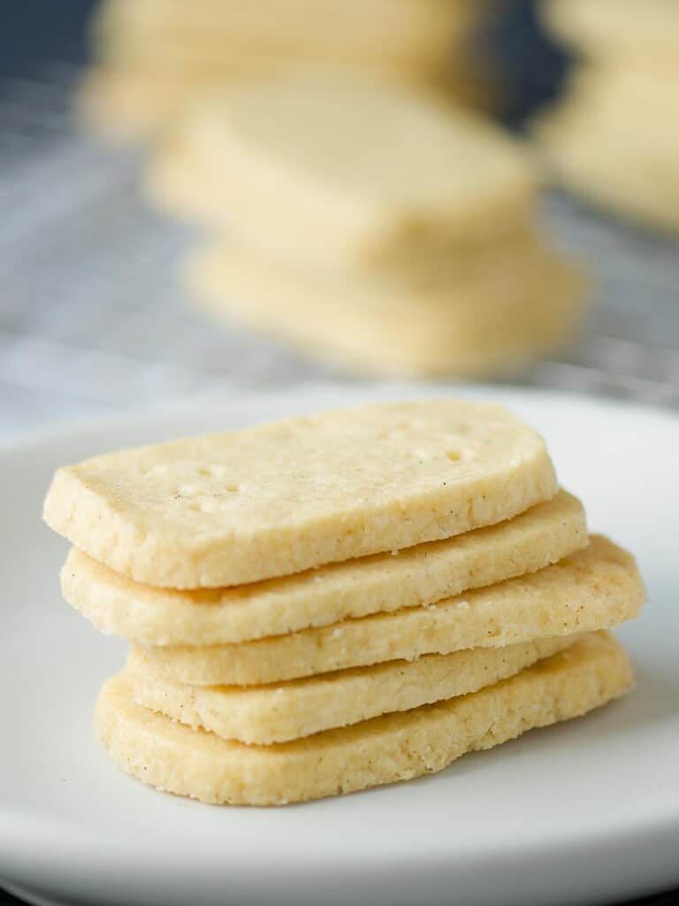 a plate of crispy buttery shortbread cookies