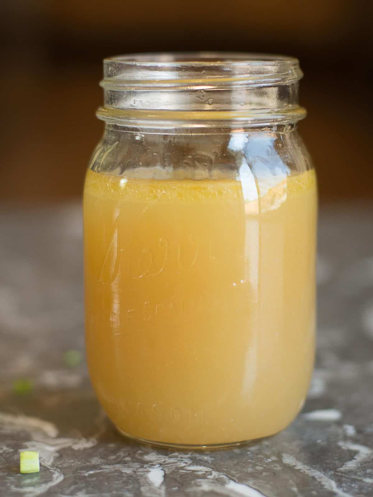 homemade bone broth in a mason jar