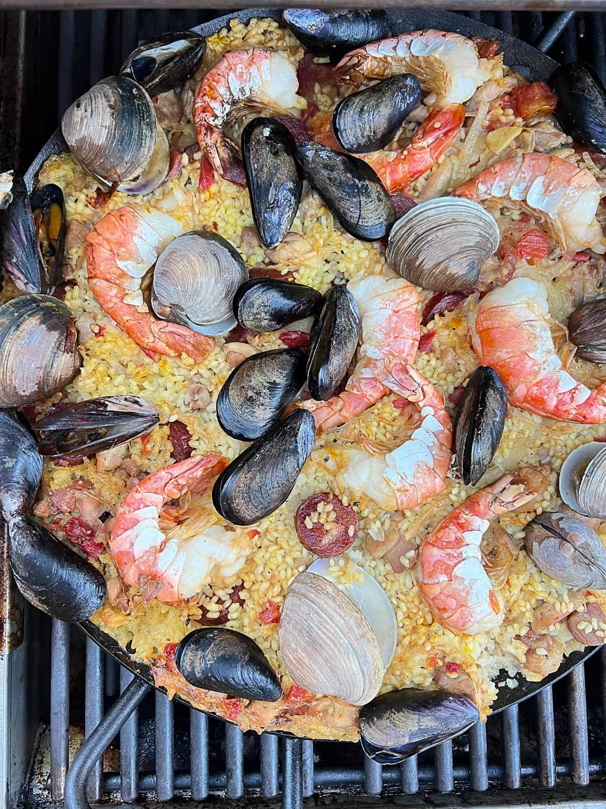 spanish paella with mussels and prawns and chorizo