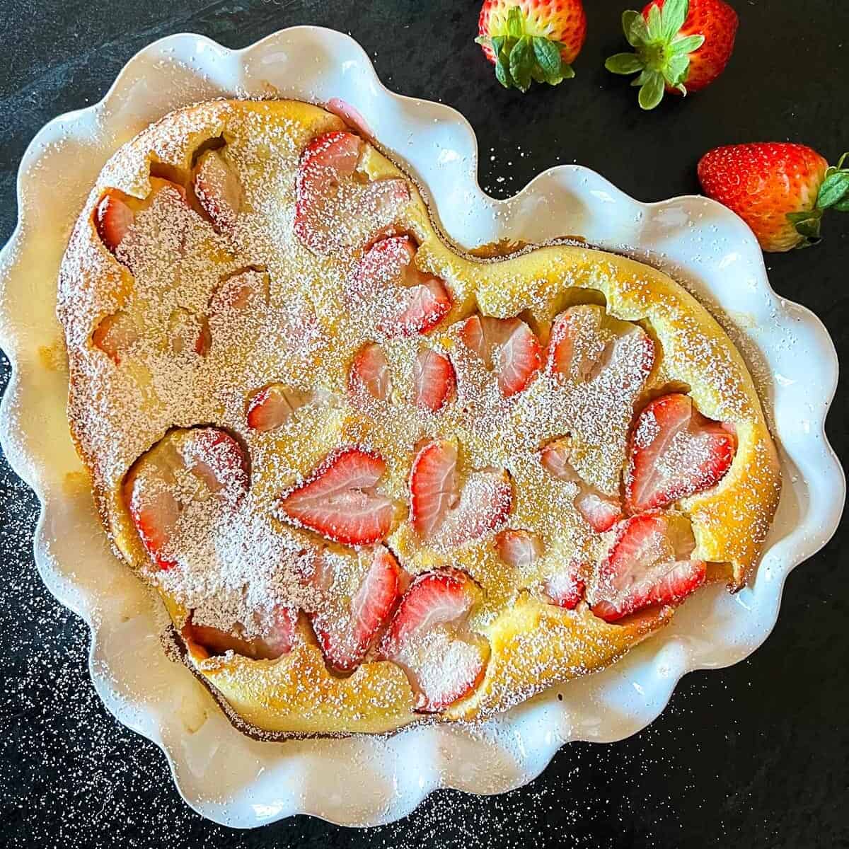 https://www.foodologygeek.com/wp-content/uploads/2022/01/strawberry-clafouti-e1654223912789.jpg