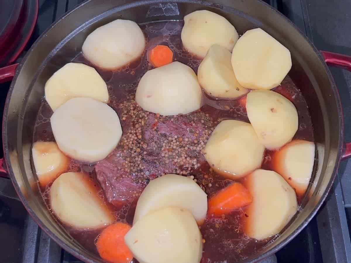 add the potatoes and the carrots