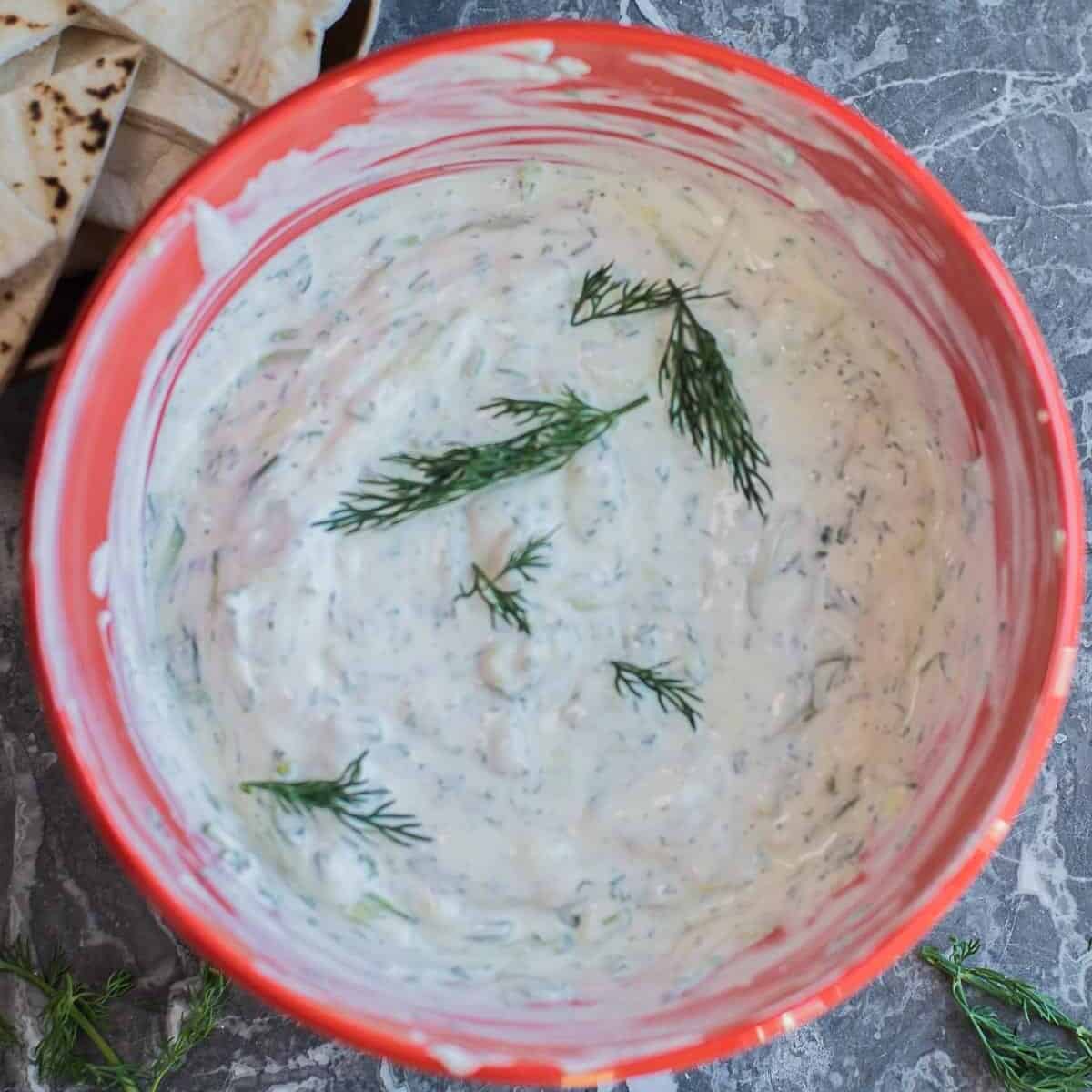 Creamy homemade tzatziki recipe with fresh pitas