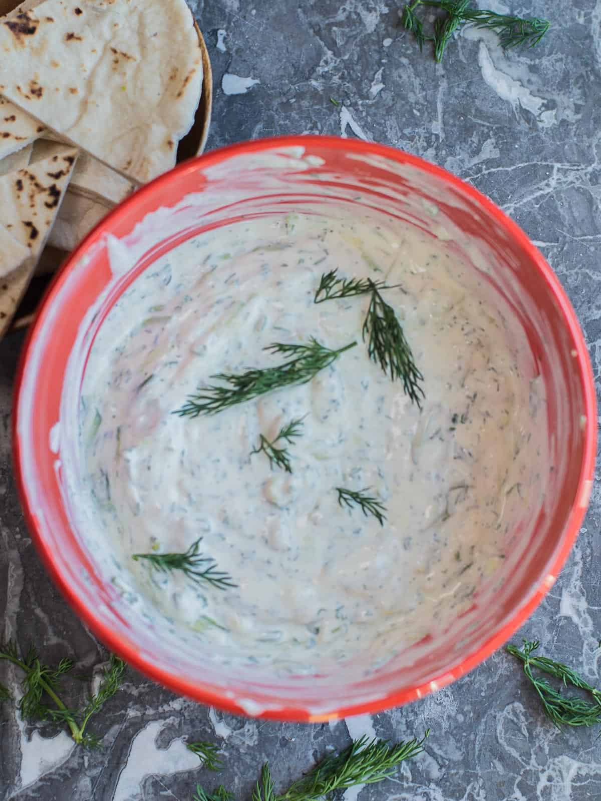 Creamy homemade tzatziki recipe with fresh pitas