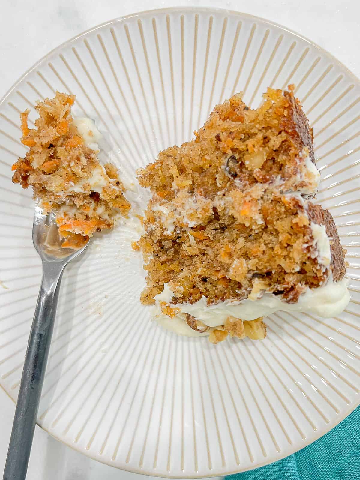 slice of super moist carrot cake 