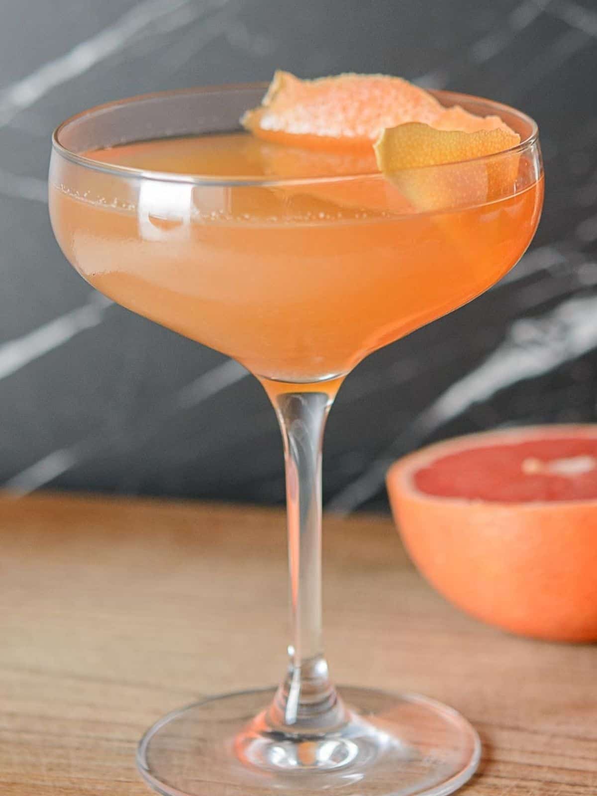 brown derby cocktail in a coupe glass